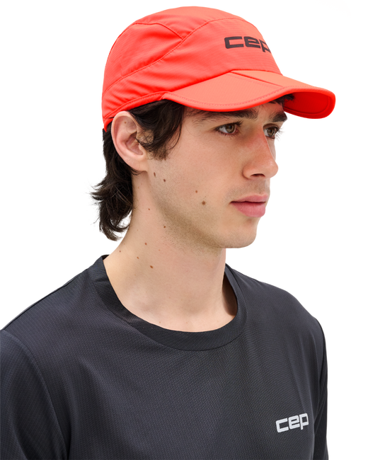 Șapcă pliabilă alergare CEP Run | protecție UV și ventilație - neon coral
