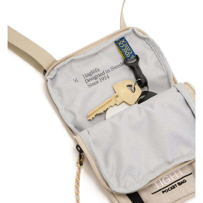 Haglöfs Tight Pocket Bag – Geantă plată de buzunar - Bej Chalk Beige/True Black