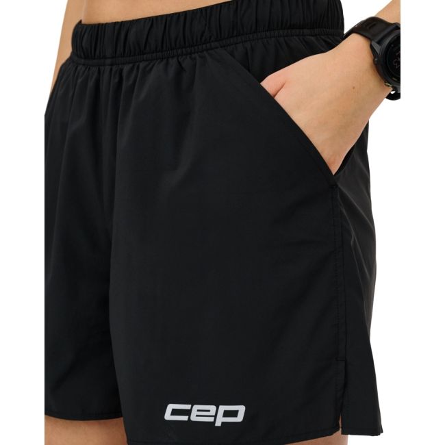 Pantaloni scurți alergare CEP Core Run Loose Fit femei - negru | largi, rezistenți vânt